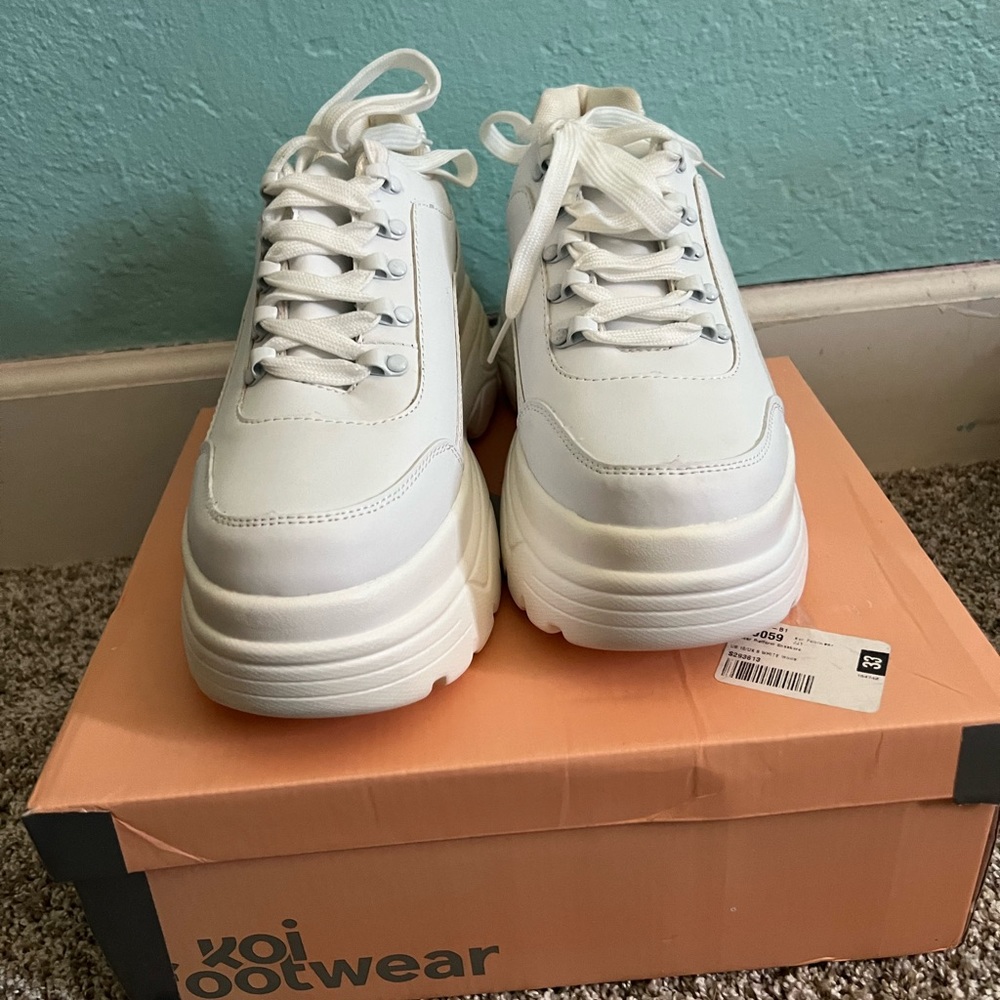 Never worn but does have some staining from the factory, women’s size 8